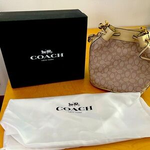 Brand new with box tag and dust bag.